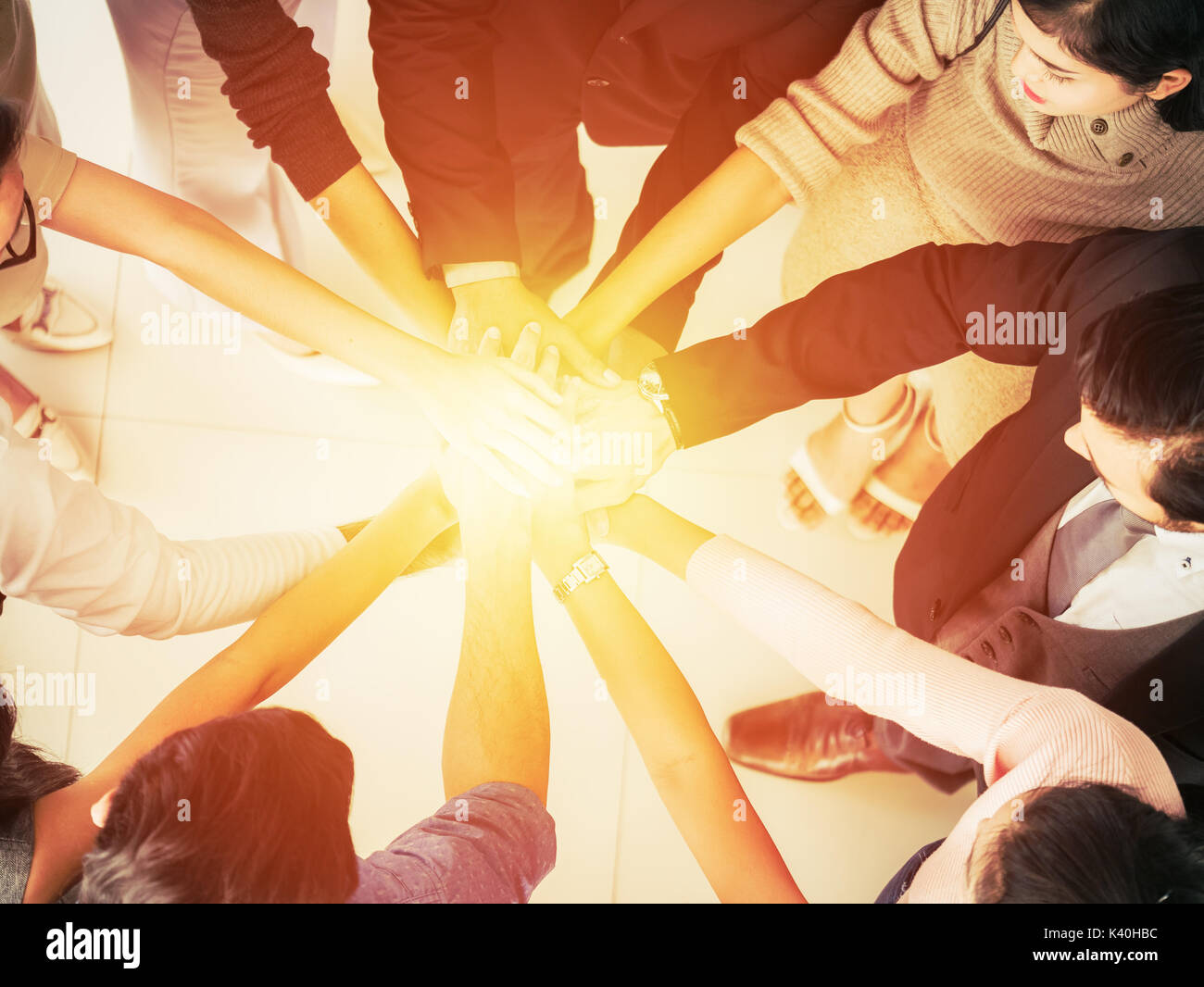Hands of business team on workspace background top view,business team concept Stock Photo