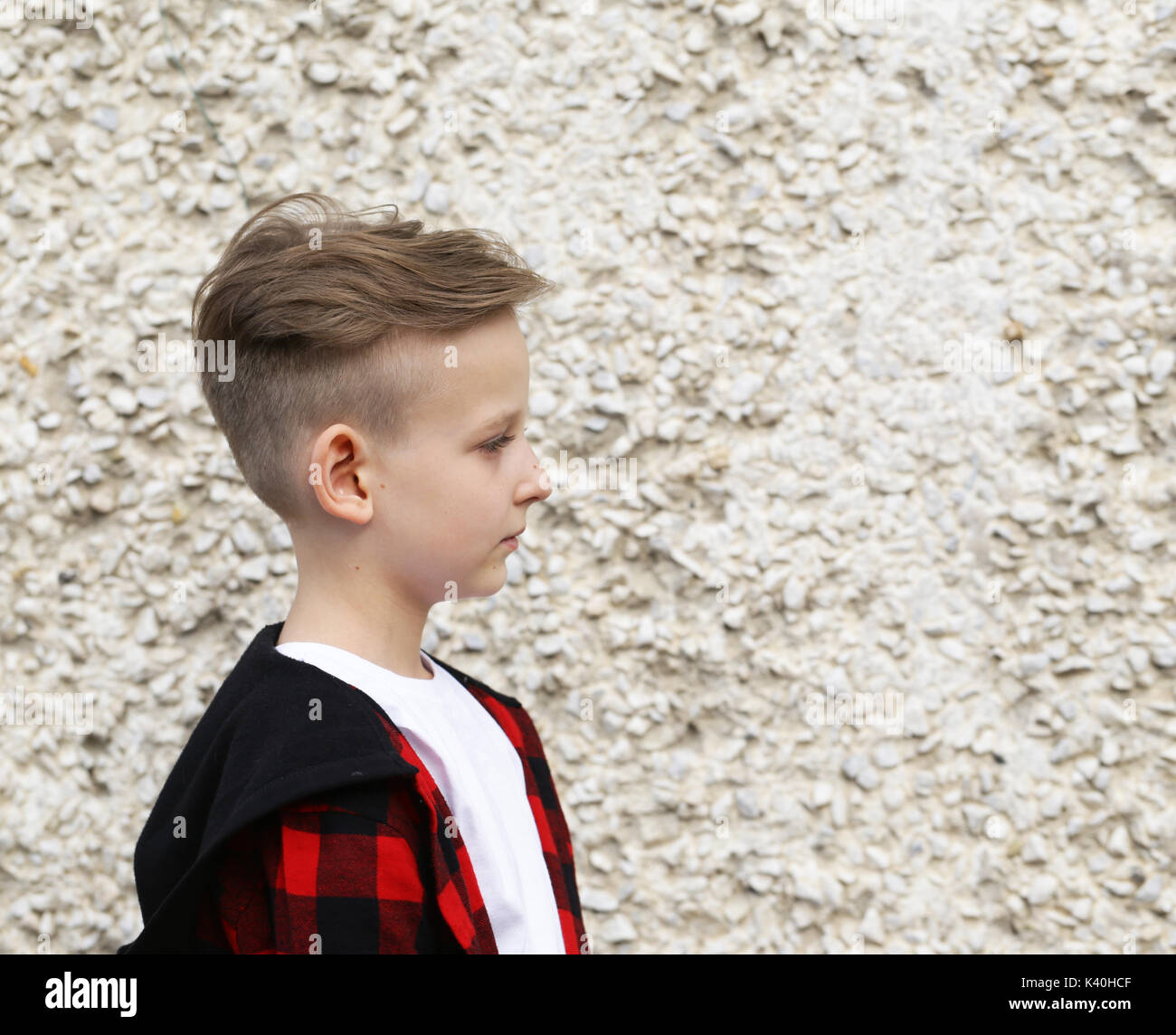 Portrait Of A Blonde Boy Casual Style Fashionable Haircut Stock