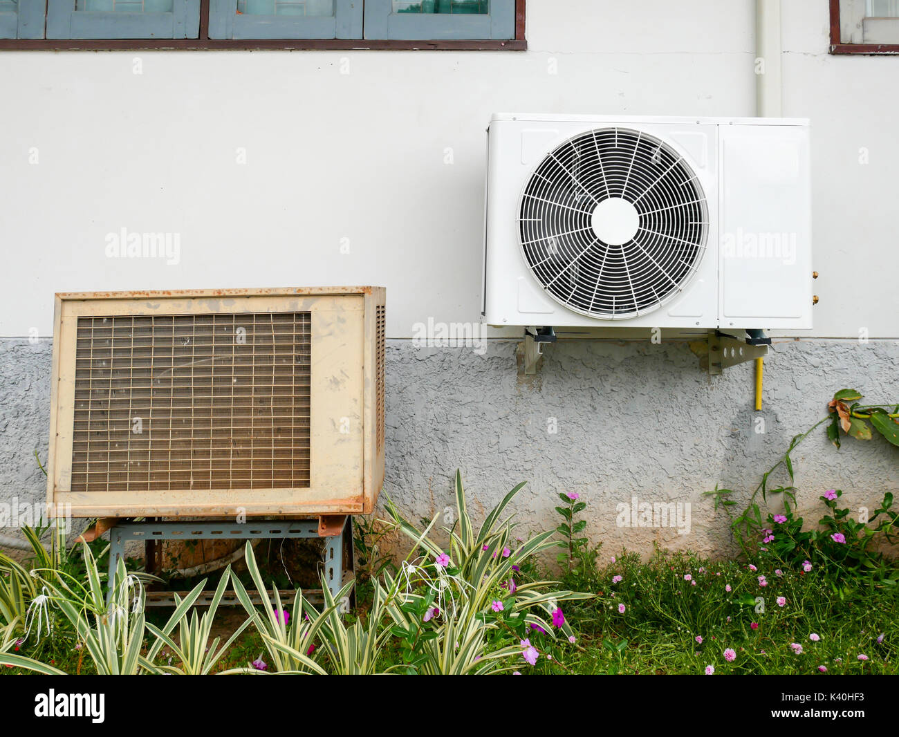 New Air Conditioner Condenser And Old Air Conditioner Condenser Unit Standing Outdoors Stock Photo Alamy