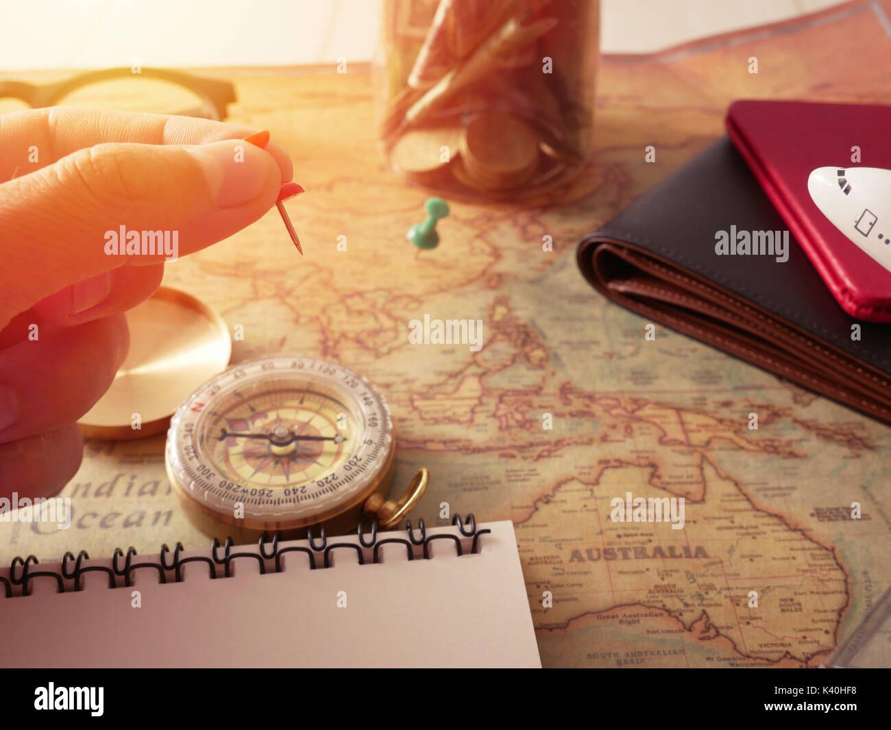 Planning travel concept, travel accessories.Sticky on map Passports, luggage, compass and airplane model, The cost of travel maps prepared for the trip with copy space in center vintage tone Stock Photo