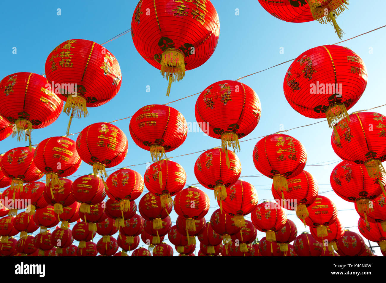 Chinese lanterns hanging on a clear blue sky Stock Photo