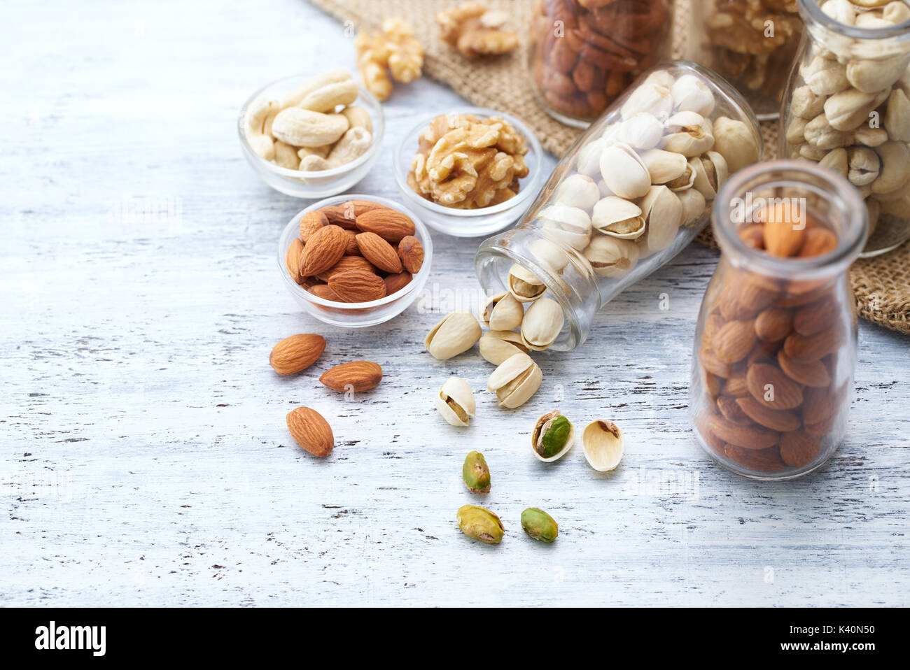 Healthy nuts on white painted wood background Stock Photo
