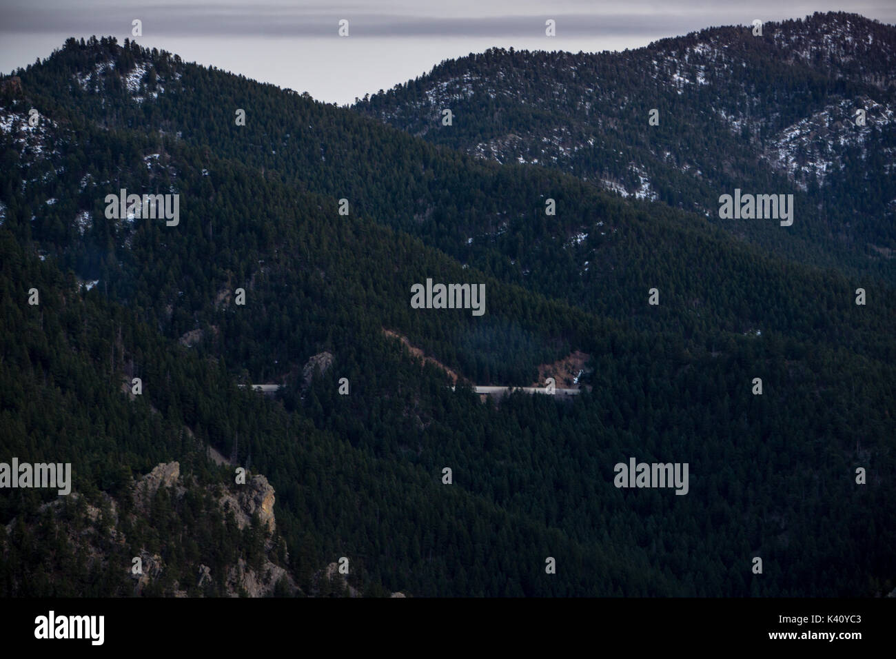 A train passes through multiple tunnels in Eldorado Canyon State Park, Colorado. Stock Photo