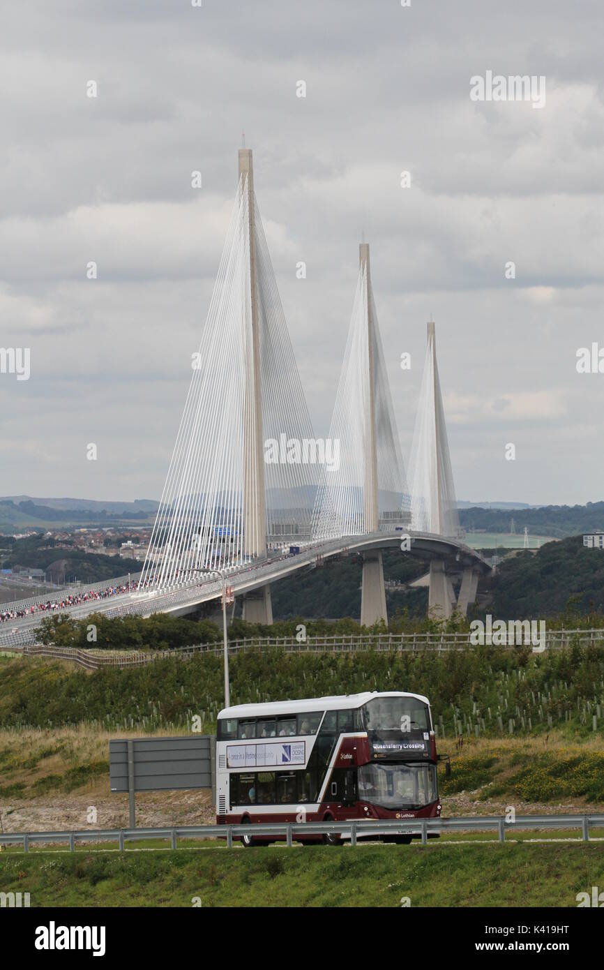 Shuttle bus with Queensferry Crossing bridge during Queensferry Crossing Experience Firth of Forth Scotland  2nd September 2017 Stock Photo