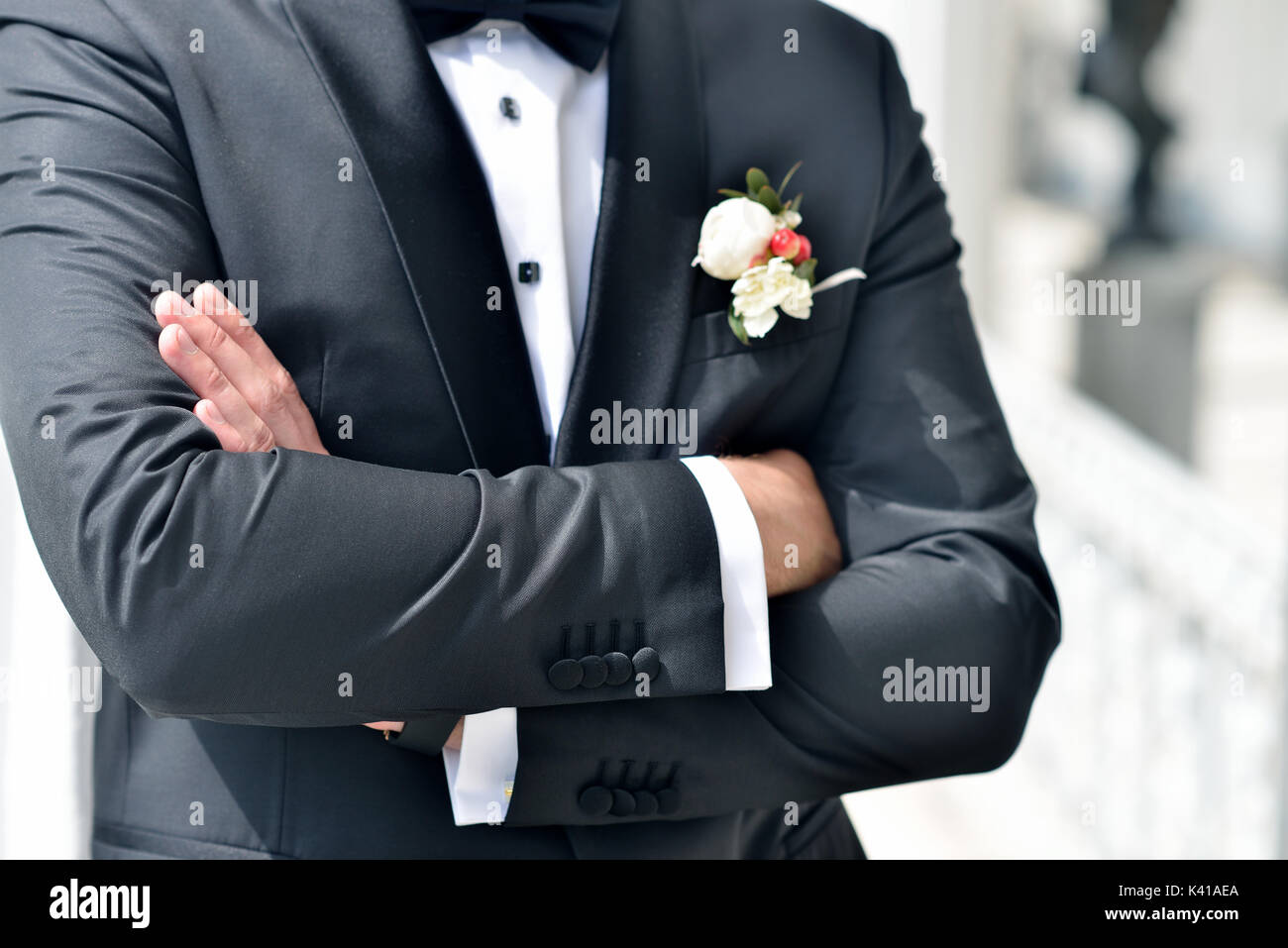 Cute boy in black suit hi-res stock photography and images - Alamy