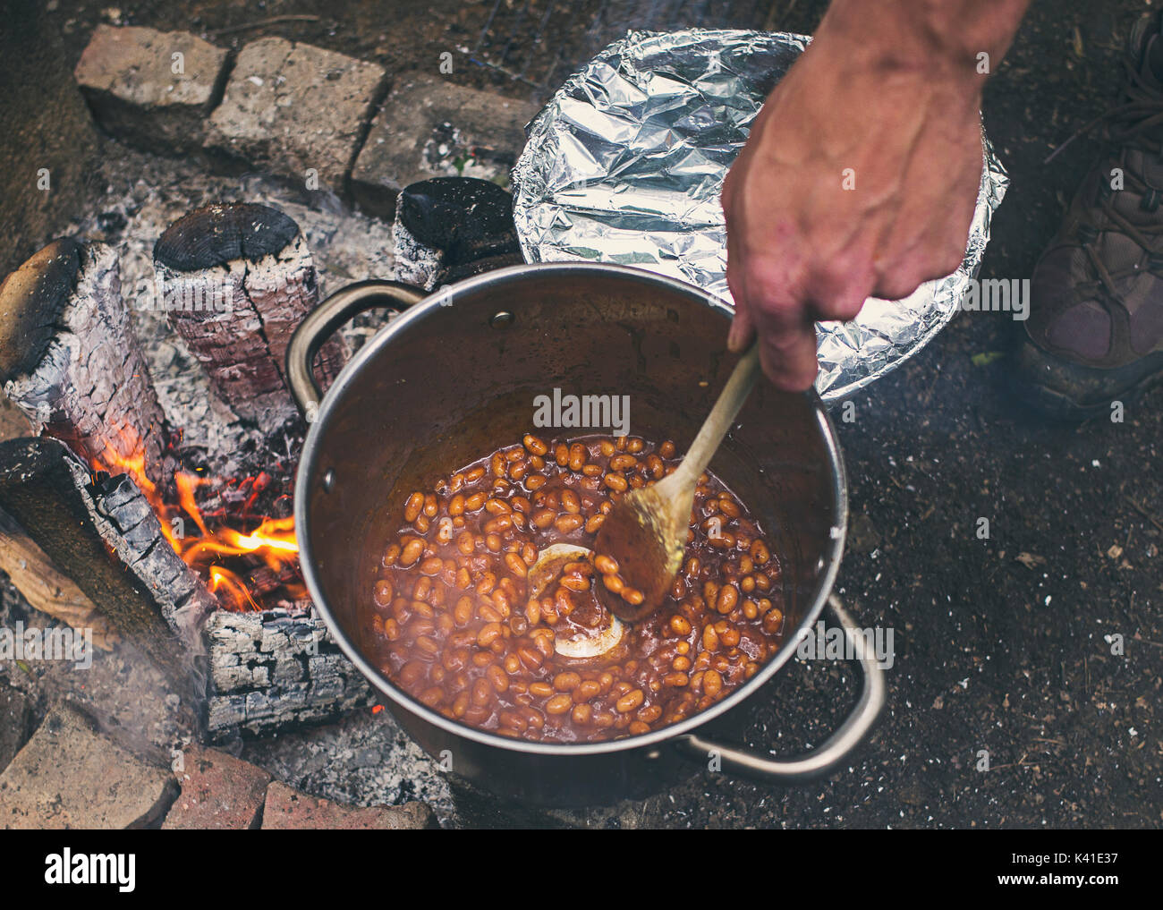 Baked beans on a campfire Stock Photo