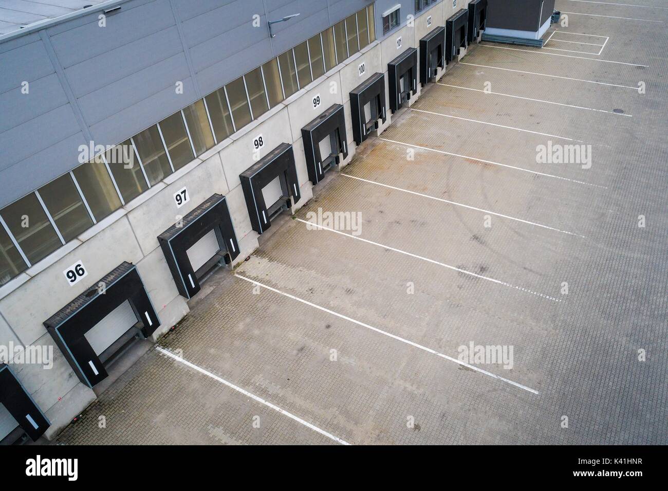 Aerial view of loading gates in distribution center warehouse Stock