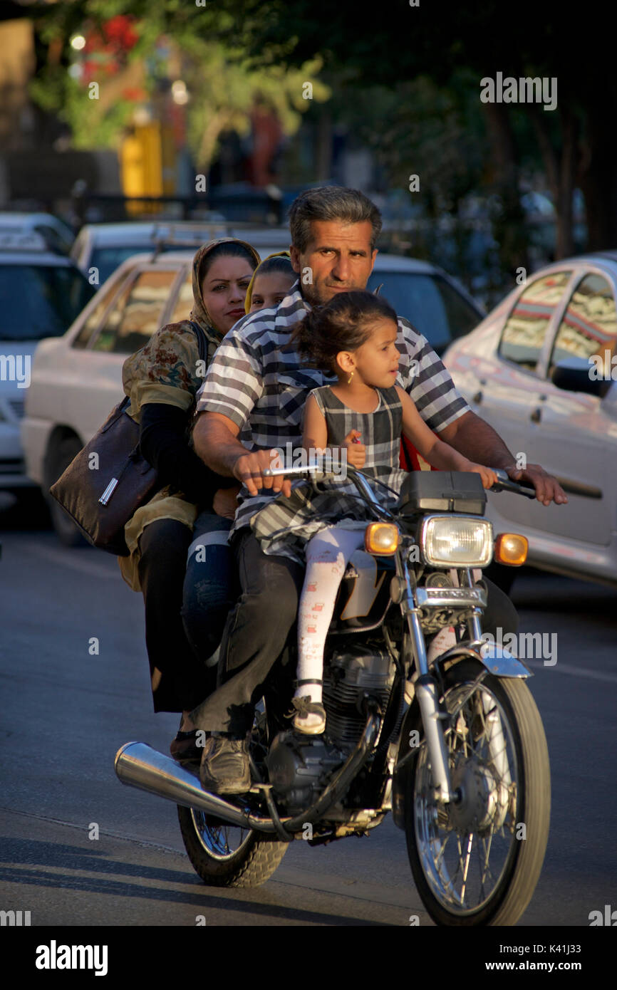 Iranian family on a motorcycle, Shiraz, Iran Stock Photo - Alamy