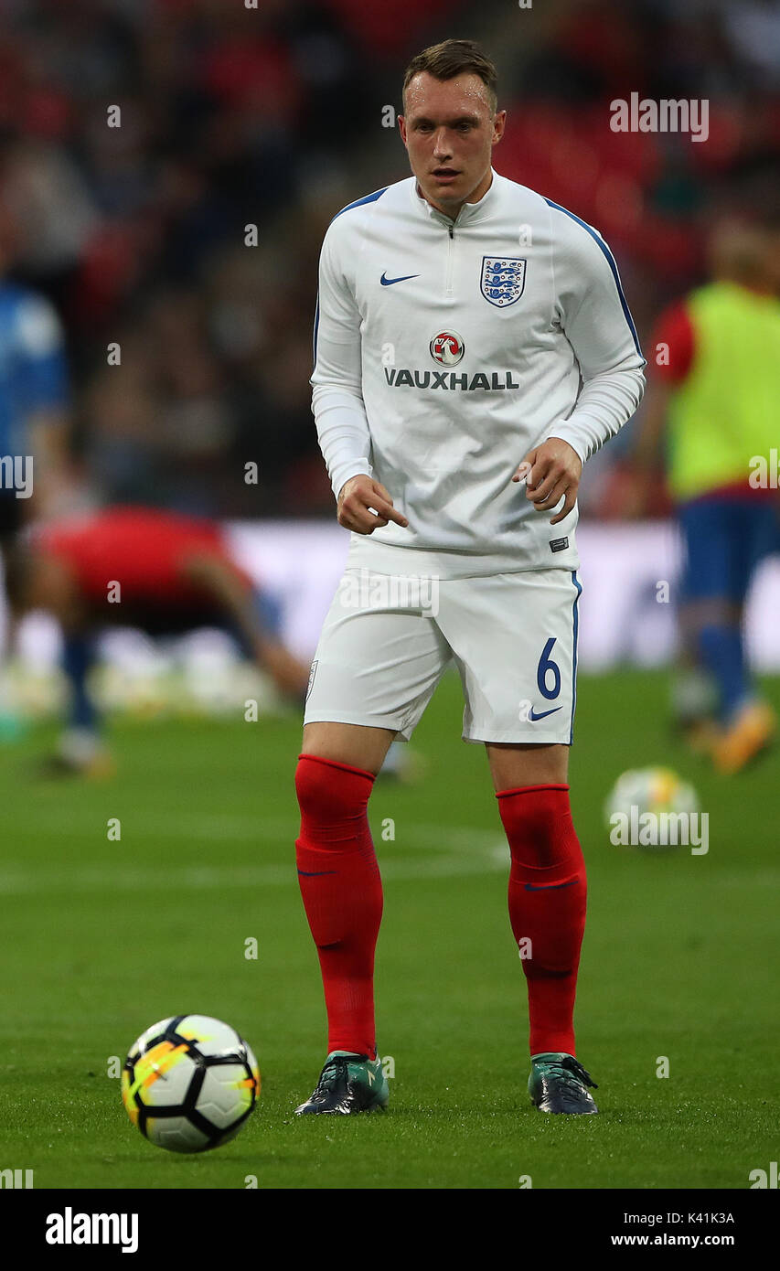 England's Phil Jones during the warm up ahead of the 2018 FIFA World Cup Qualifying, Group F match at Wembley Stadium, London. Stock Photo