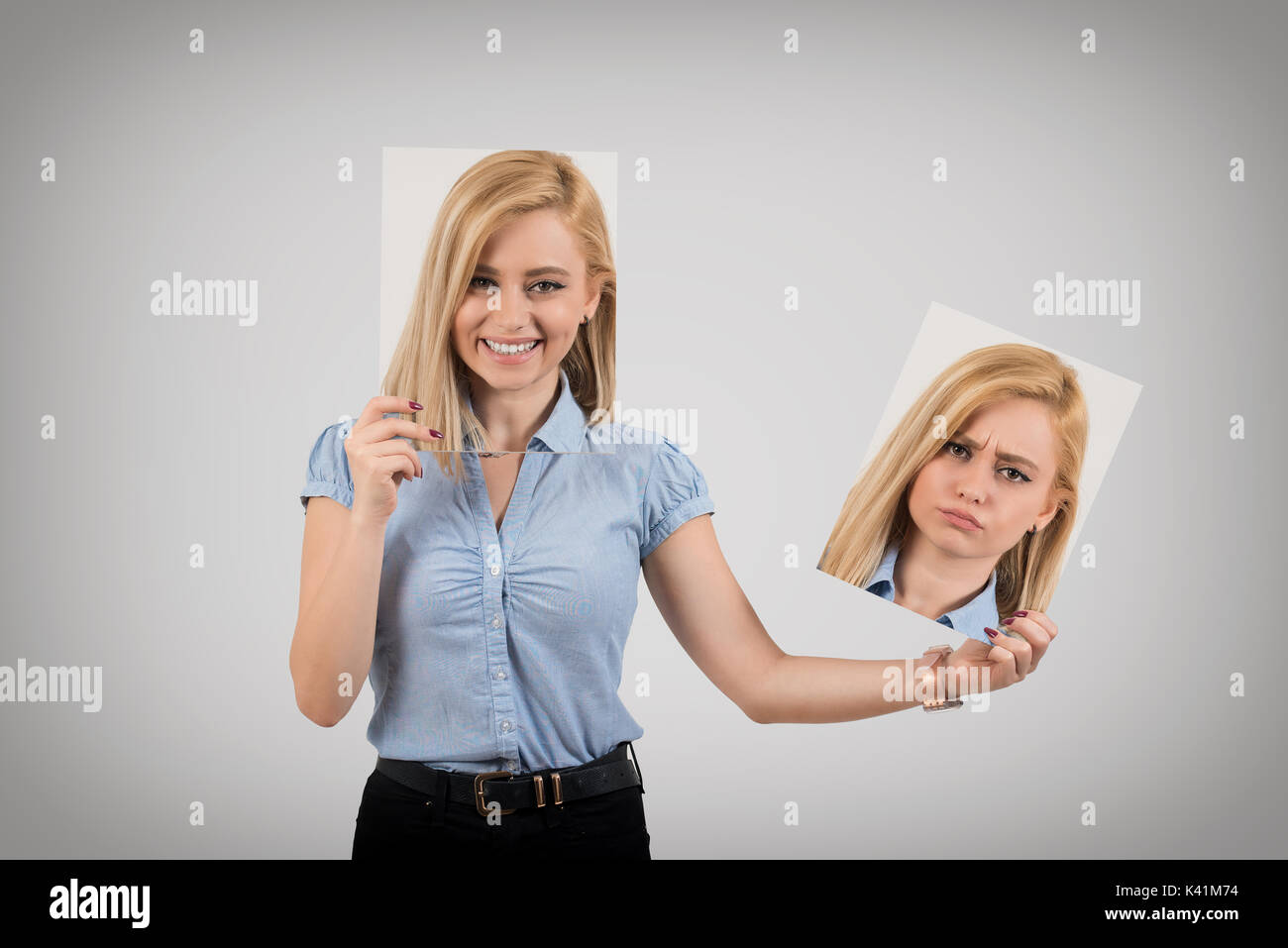 Young woman changing mood from being happy to getting upset and angry Stock Photo