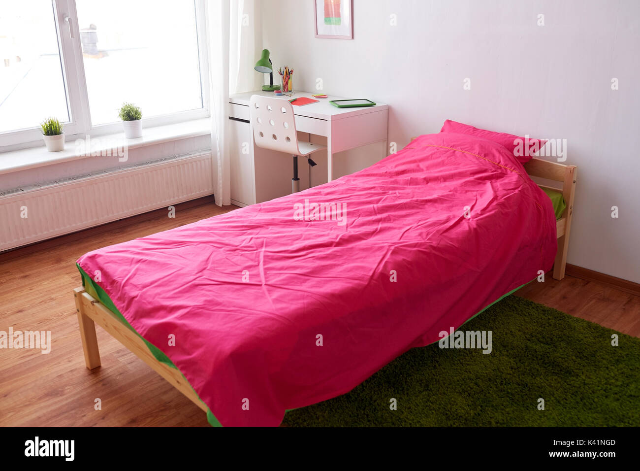 kids room interior with bed, table and accessories Stock Photo