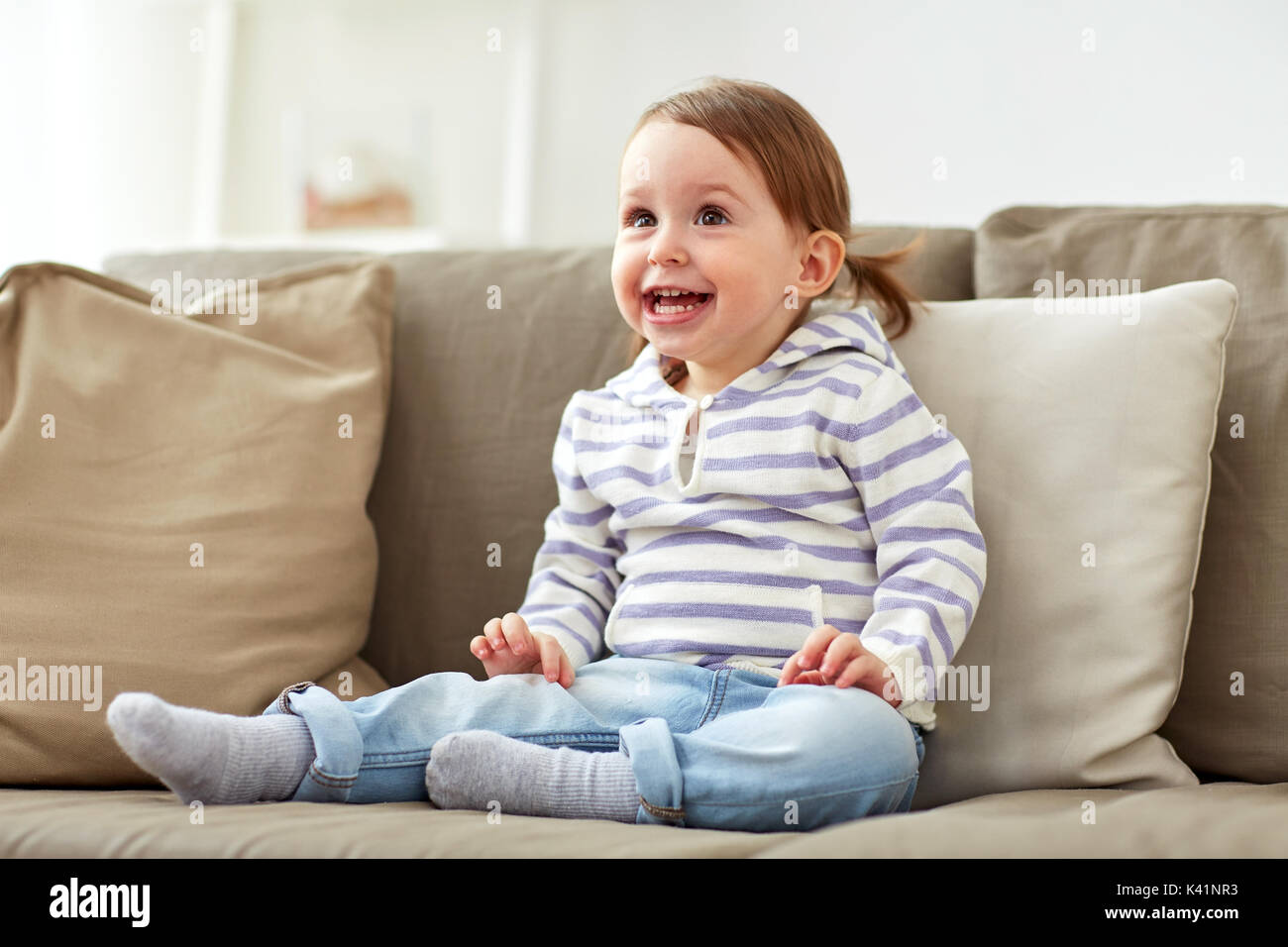 Little Baby Girl Sitting On The Dresser Stock Photo Royalty Free