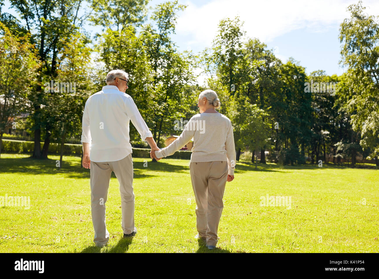 Cute old couple walking holding hands hi-res stock photography and ...