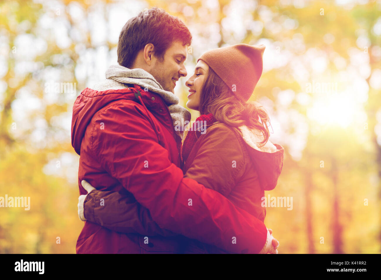 Young couple hugging teenager hi-res stock photography and images - Alamy