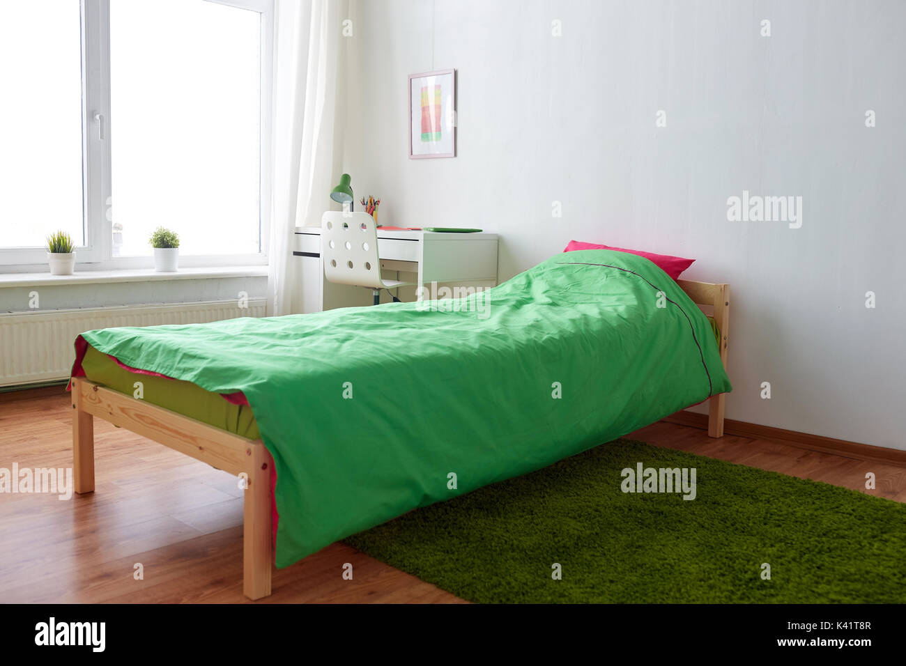 kids room interior with bed, table and accessories Stock Photo Alamy