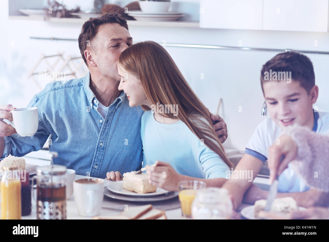 Son father forehead hi-res stock photography and images - Alamy