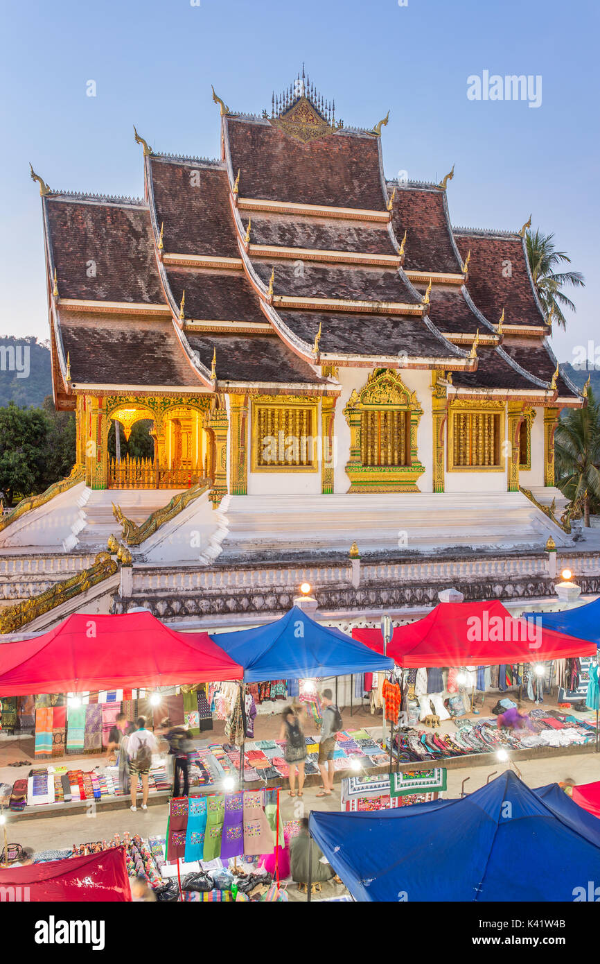 Famous night market and the Haw Pha Bang temple in Luang Prabang, inside the Royal Palace complex, in Laos Stock Photo