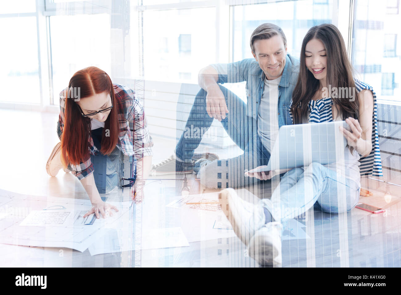 Cheerful colleagues working in the office Stock Photo