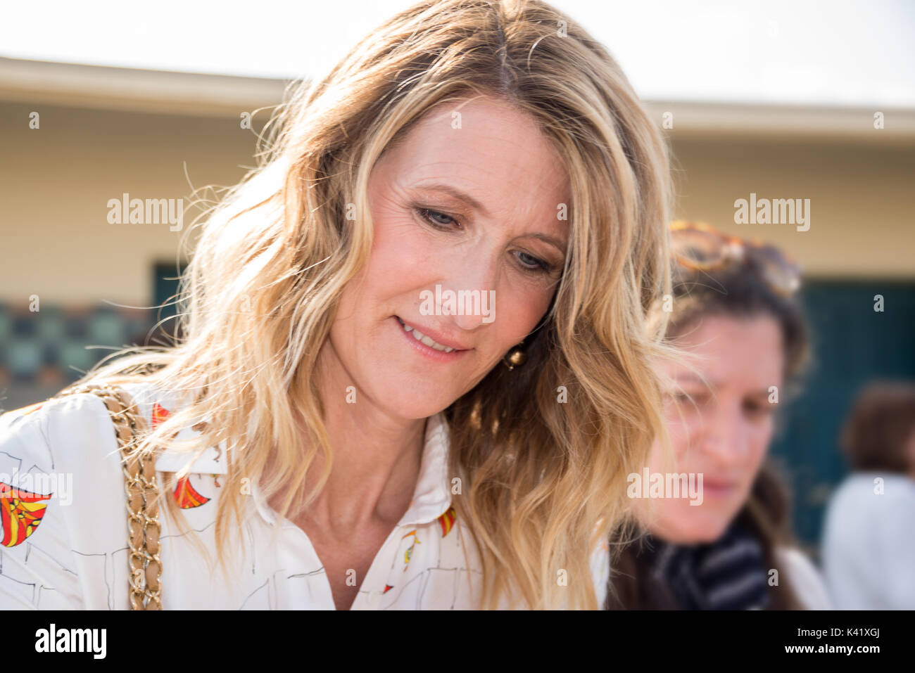 Laura Dern signing autographs on the Promenade des Planches during the 43rd Deauville American Film festival, on August 2, 2017 in Deauville, France Stock Photo