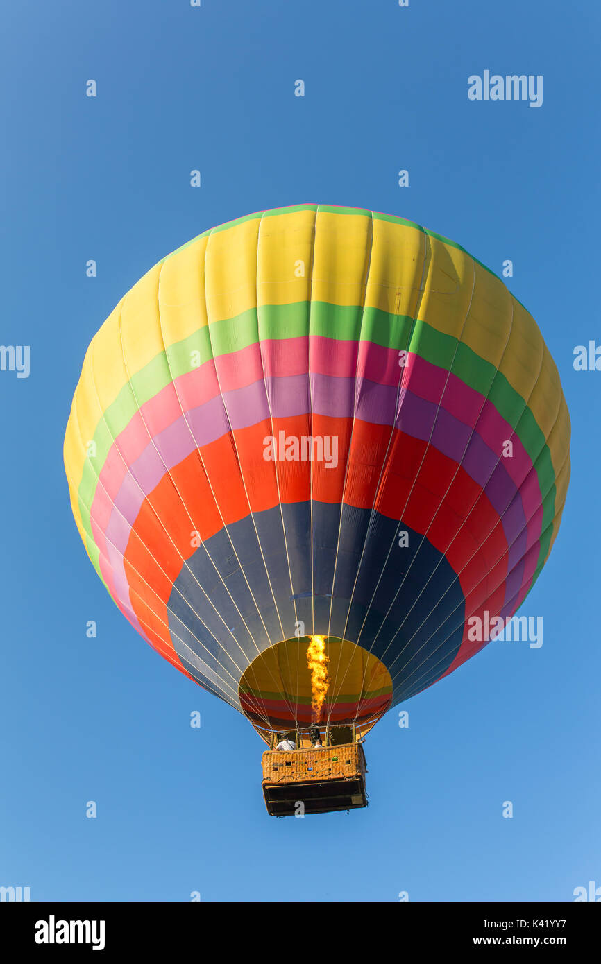 Hot air baloon in blue sky close-up Stock Photo