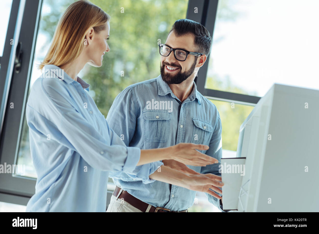 Positive business people communicating Stock Photo