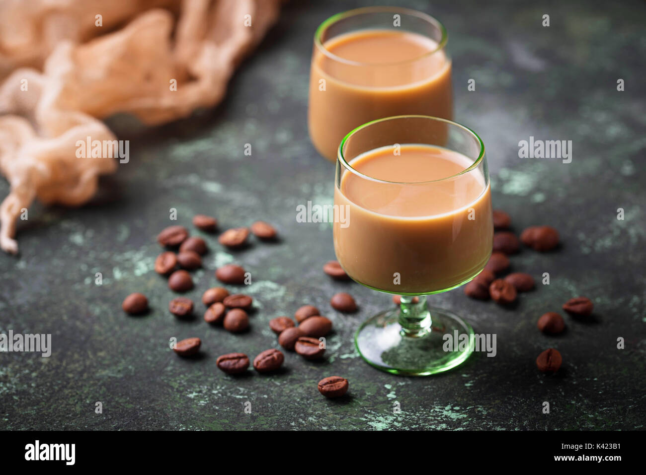 Irish cream liqueur and coffee beans Stock Photo
