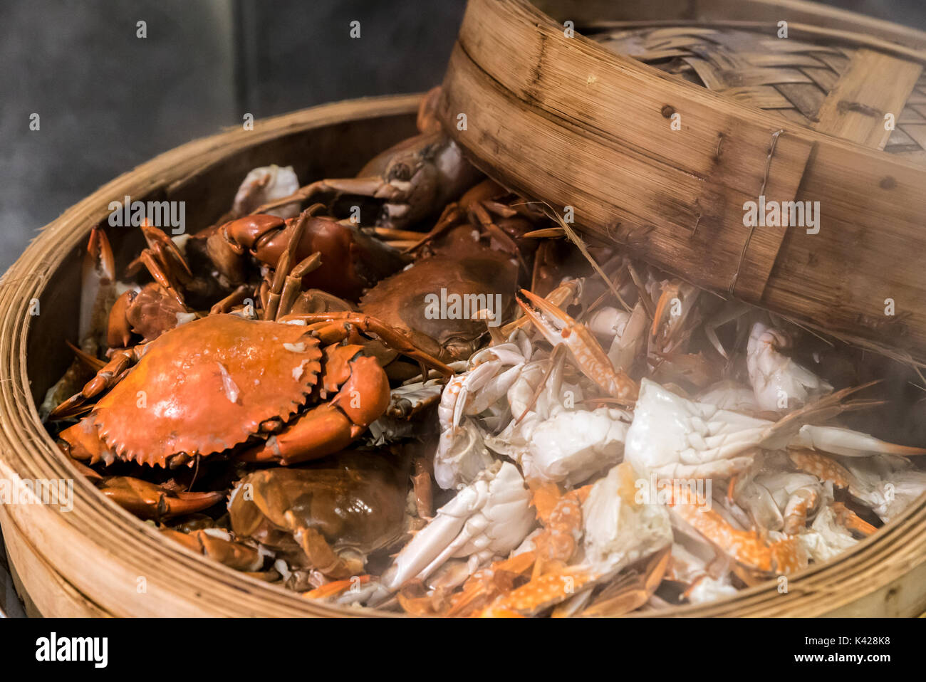 steam crab in cooking seafood steamer basket Stock Photo Alamy