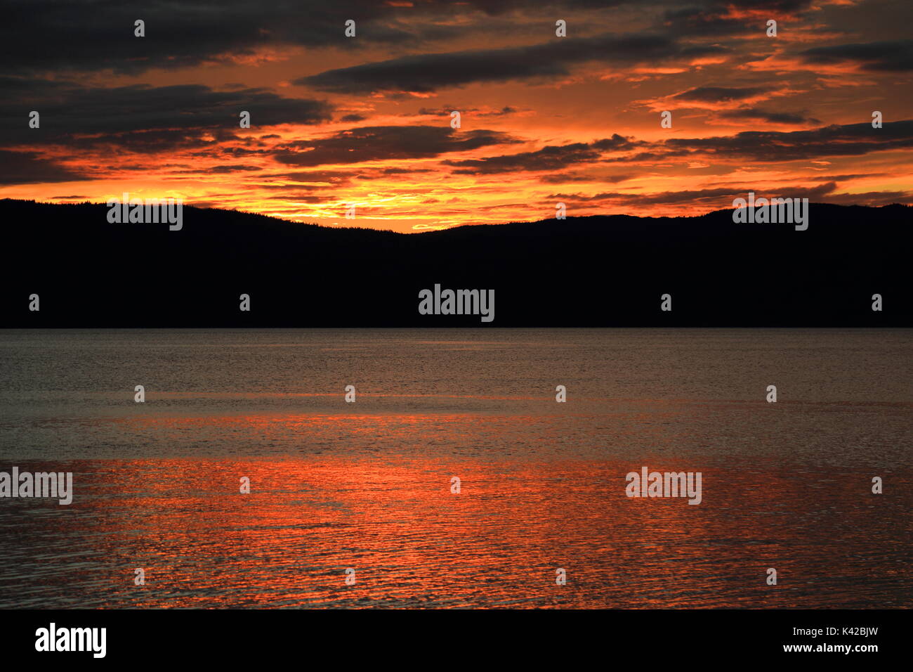 Sunset over Norwegian fjord Stock Photo