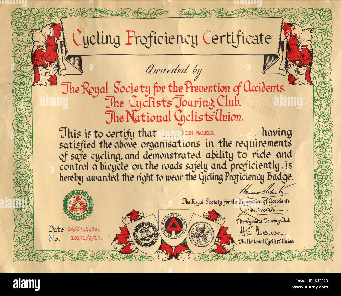 Cycling Proficiency Certificate from the 1950s. These tests were often taken in the school playground.  A lapel badge was also awarded. Stock Photo