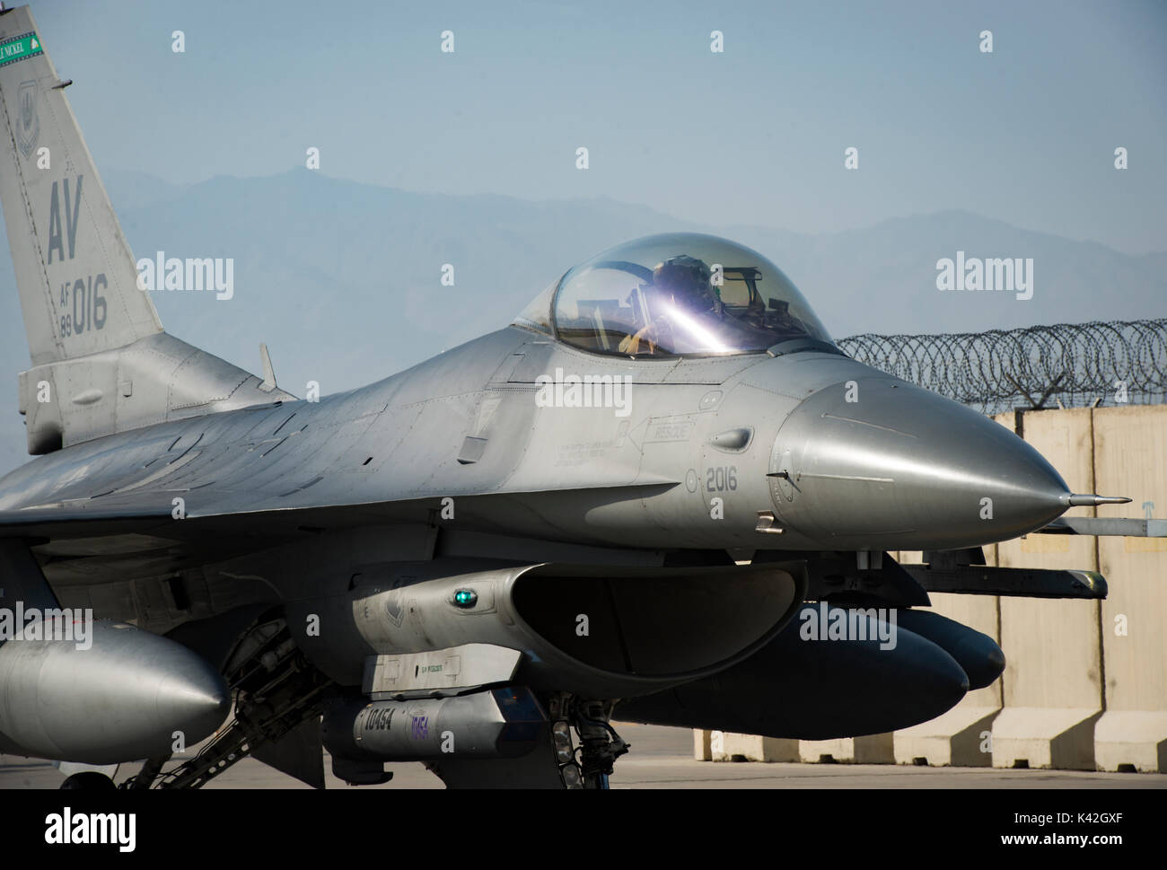 An F-16 Fighting Falcon taxis on the flightline. Stock Photo