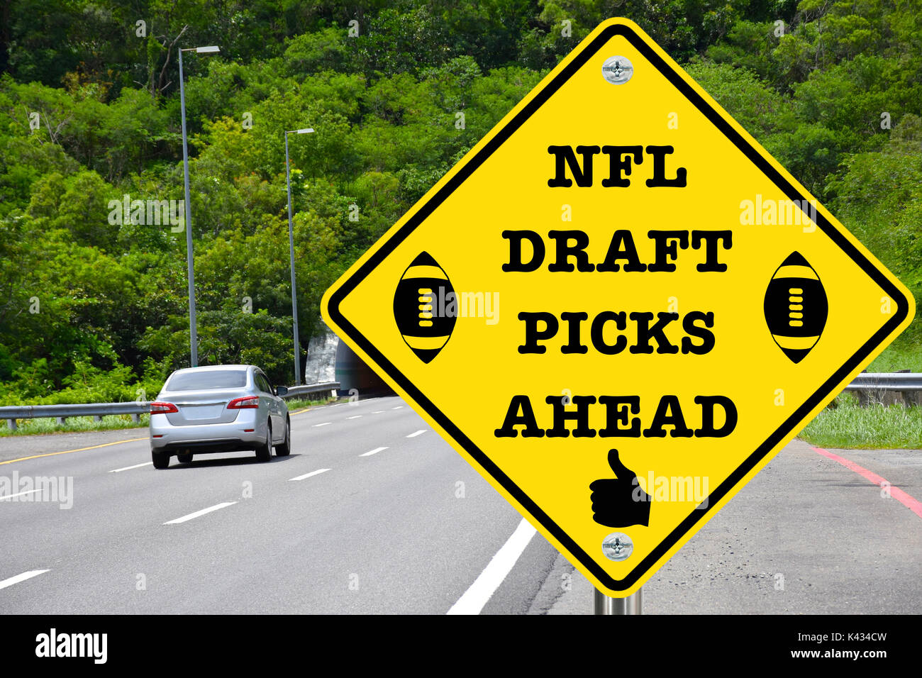 NFL draft picks ahead, yellow warning street sign Stock Photo