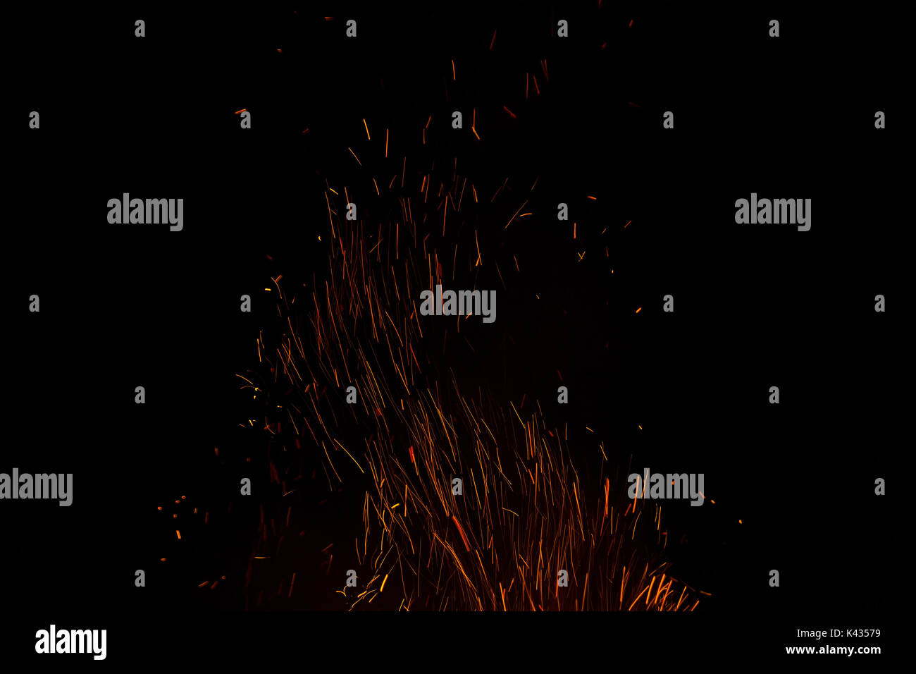 fire flames with sparks on a black background Stock Photo