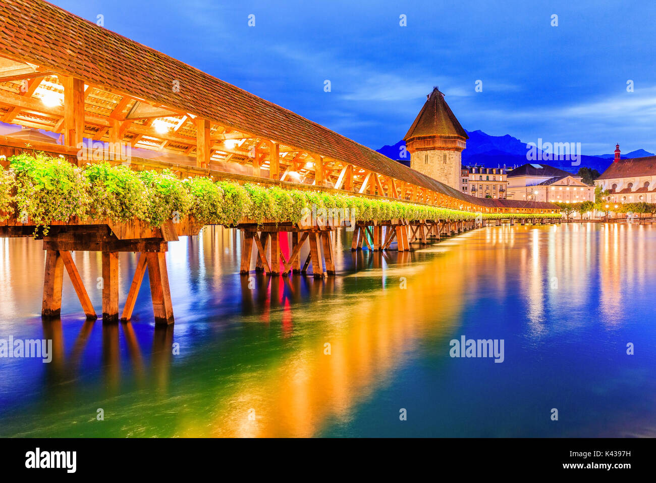 Lucerne, Switzerland. Historic city center with its famous Chapel Bridge and Mt. Pilatus on the background. (Vierwaldstattersee), Stock Photo