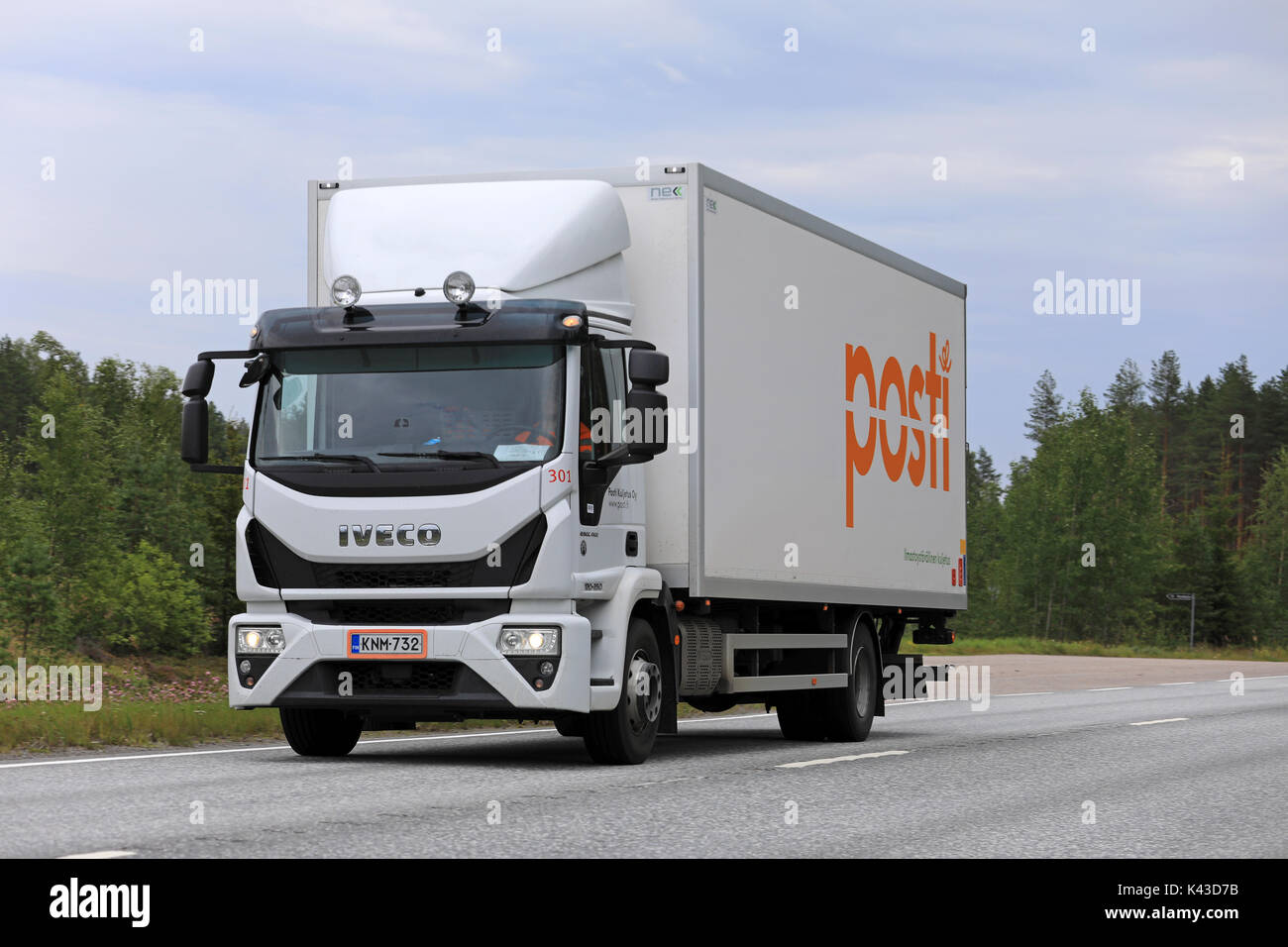 KUORTANE, FINLAND - AUGUST 12, 2017: White Iveco Eurocargo 120-250 delivery truck of Posti Kuljetus Oy on the road. The fourth generation Iveco Euroca Stock Photo