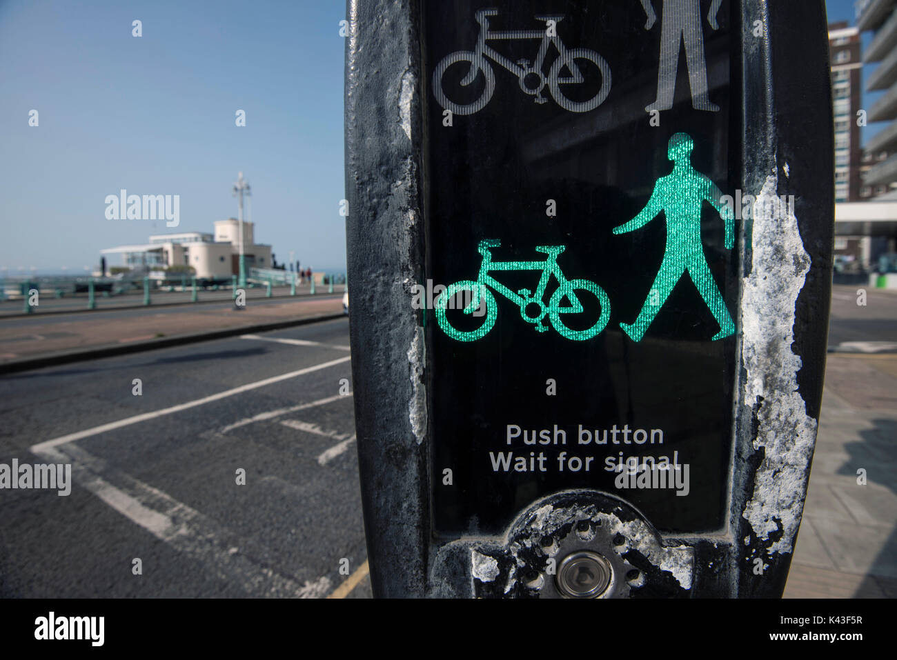 Pedestrian crossing lights in Brighton indicating cross now. Credit
