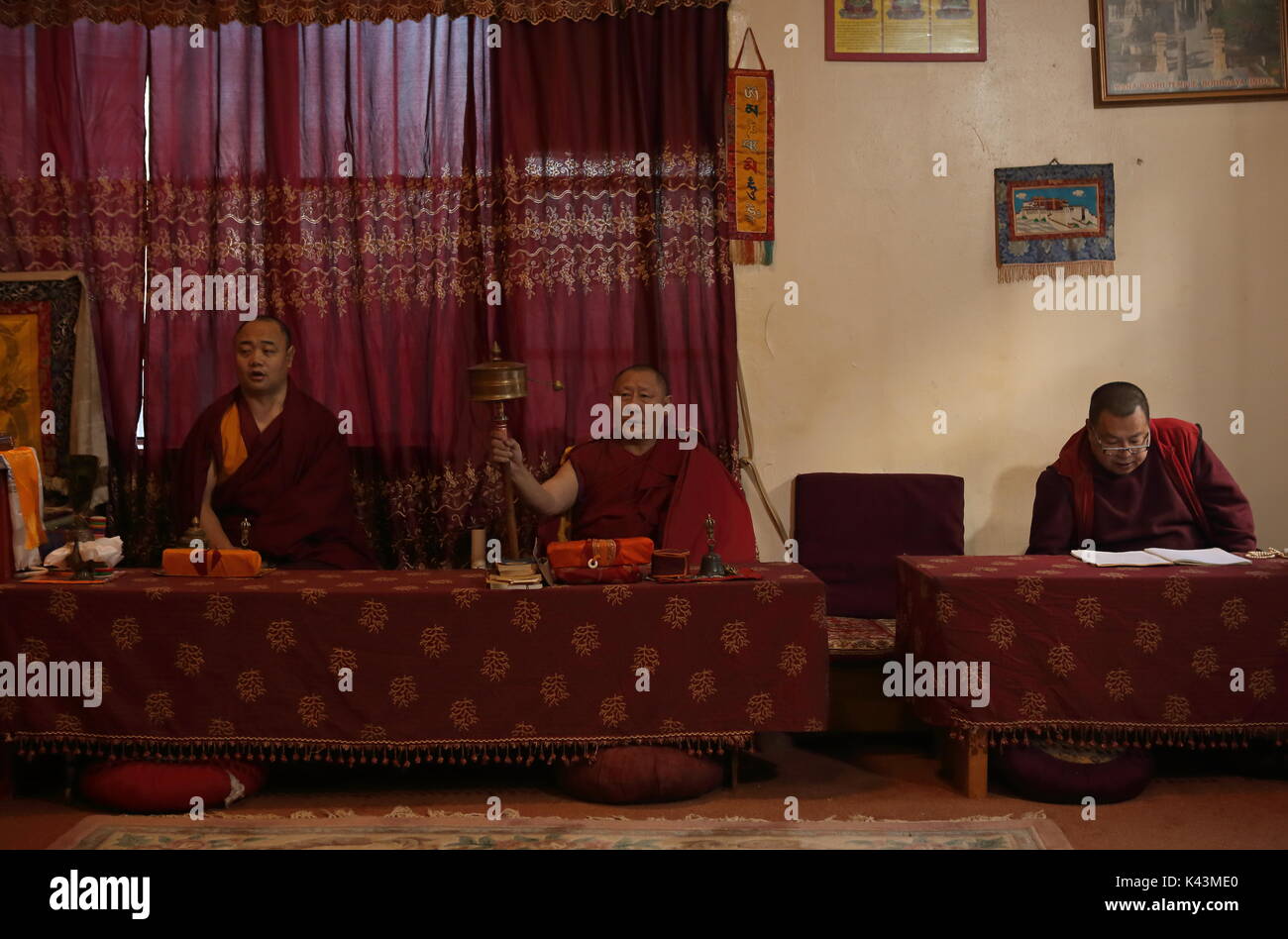 Lama Sanggon, Lama Namka and Molan Lama conduct morning puja ceremonies ...
