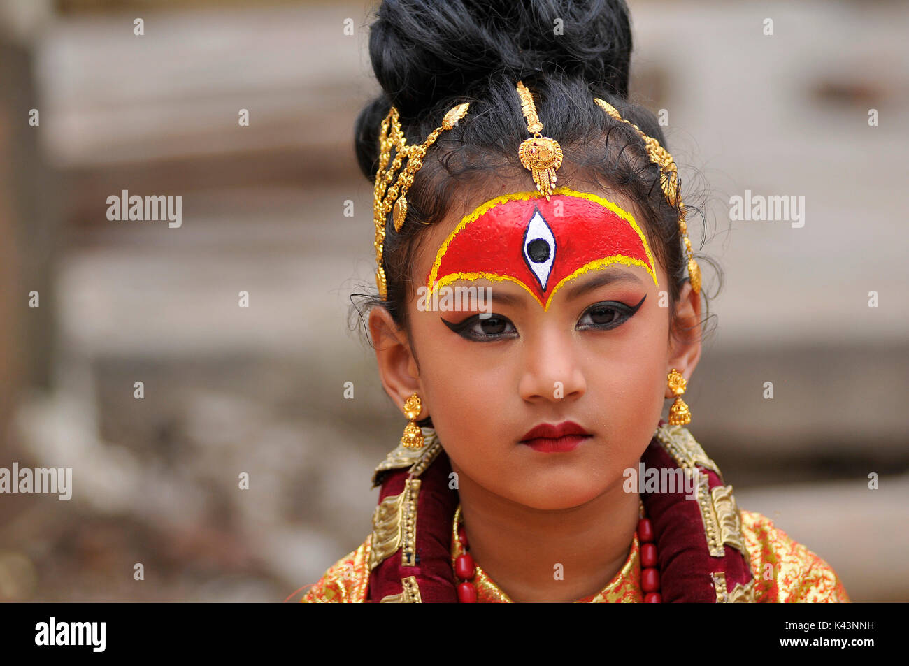 Kathmandu, Nepal. 04th Sep, 2017. A Portrait of Nepalese young girl impersonate as a Kumari or living Goddess participate during celebration of Kumari puja at Basantapur Durbar Square, Katmandu, Nepal on Monday, September 04, 2017. Altogether 108 young girls under the age of nine gathered for the Kumari puja, a tradition of worshiping, which believes doing puja save small girls from diseases and bad luck in future. Credit: Narayan Maharjan/Pacific Press/Alamy Live News Stock Photo