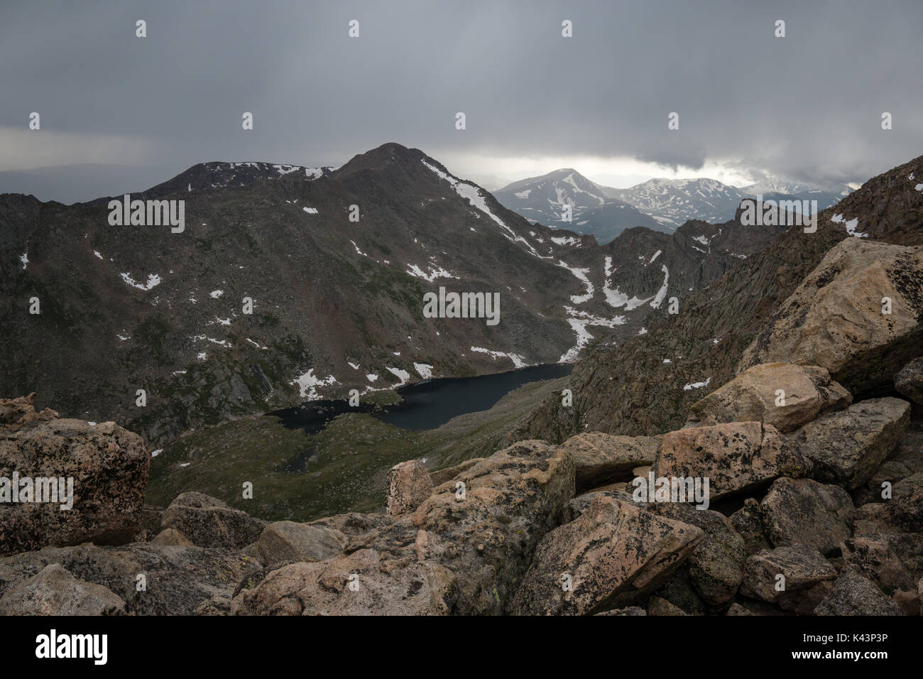 From near the summit of Mount Evans, a view of Abyss Lake and Mount Bierstadt. Stock Photo