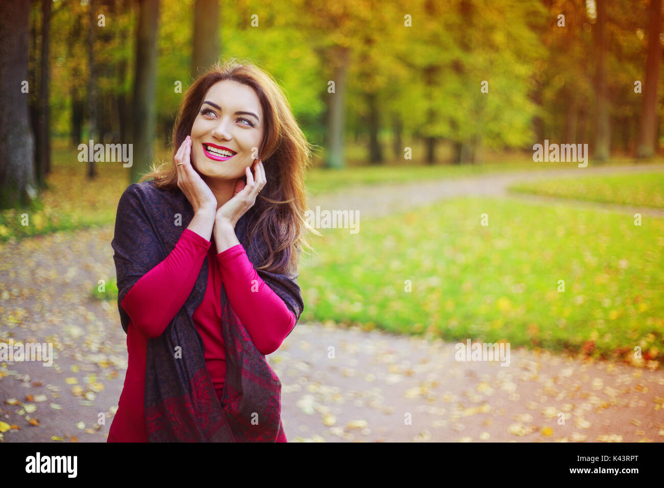 beautiful young woman in the autumn park Stock Photo - Alamy