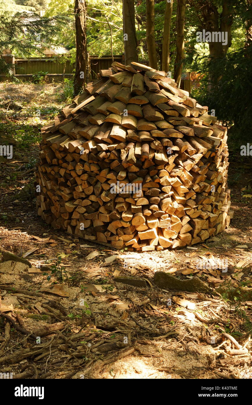 Wood, Stack Firewood, Winter Fuel, Cord Wood, Lumber, Decorative, Rustic, Wood Burner, Stove, Split Wood, Woodpile,Natural Fuel, Environmental. Stock Photo