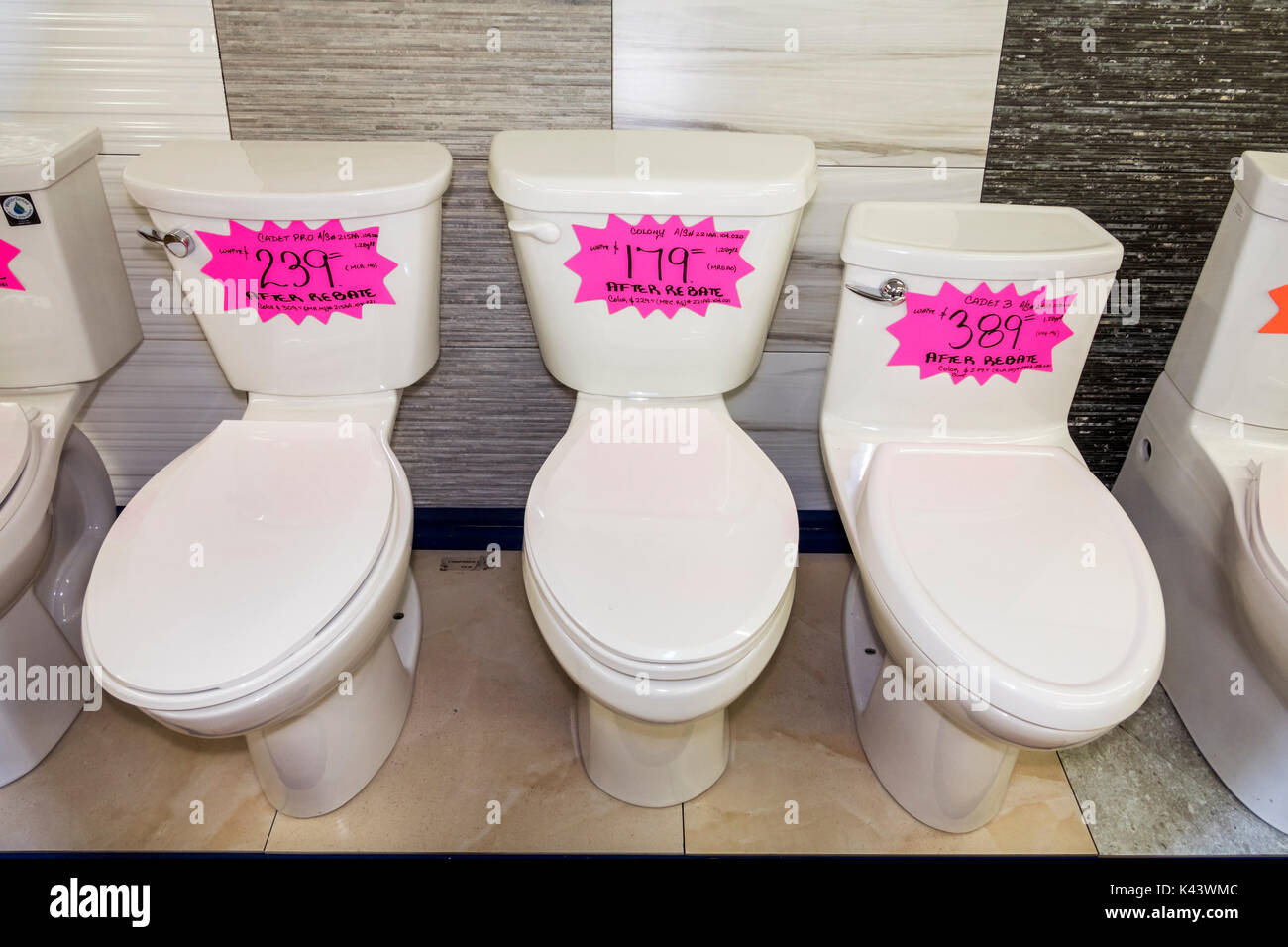 Miami Florida,new toilets,sale,display sale product,loos,commodes,prices,after rebate,visitors travel traveling tour tourist tourism landmark Stock Photo - Alamy
