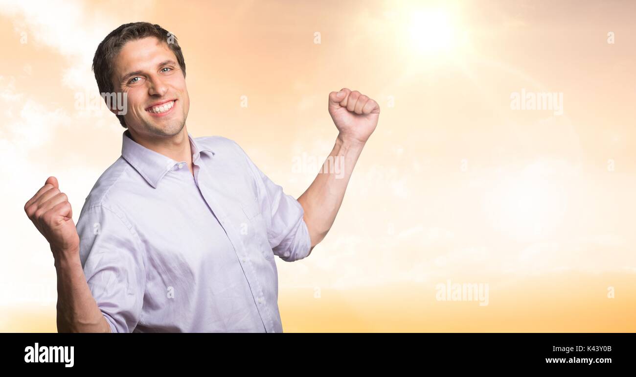 Digital composite of Man celebrating success in sunset Stock Photo - Alamy