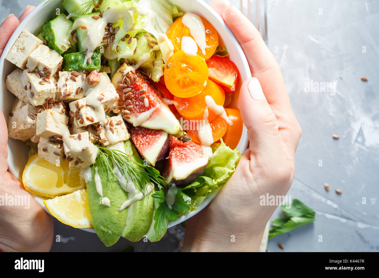 buddha bowl, vegan lunch, tofu fruit vegetables salad Stock Photo Alamy
