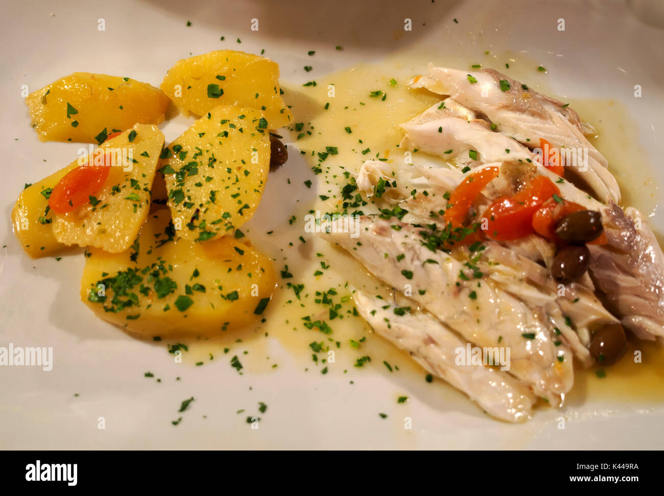 Sea Bass with new potatoes Stock Photo