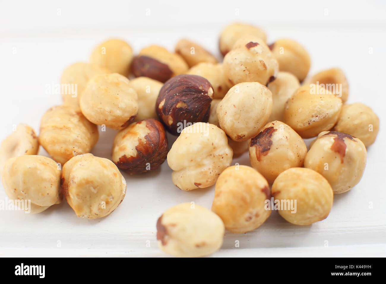A bunch  hazelnuts on a white background. Stock Photo
