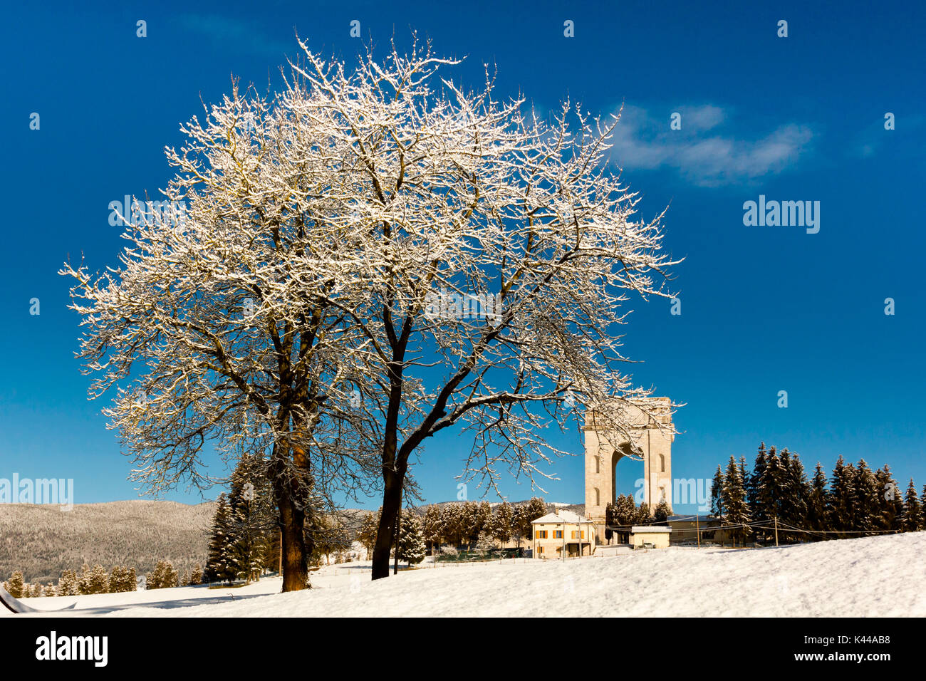 War memorial, Altopiano of Asiago, Province of Vicenza, Veneto, Italy. Military monument in winter landscape. Stock Photo