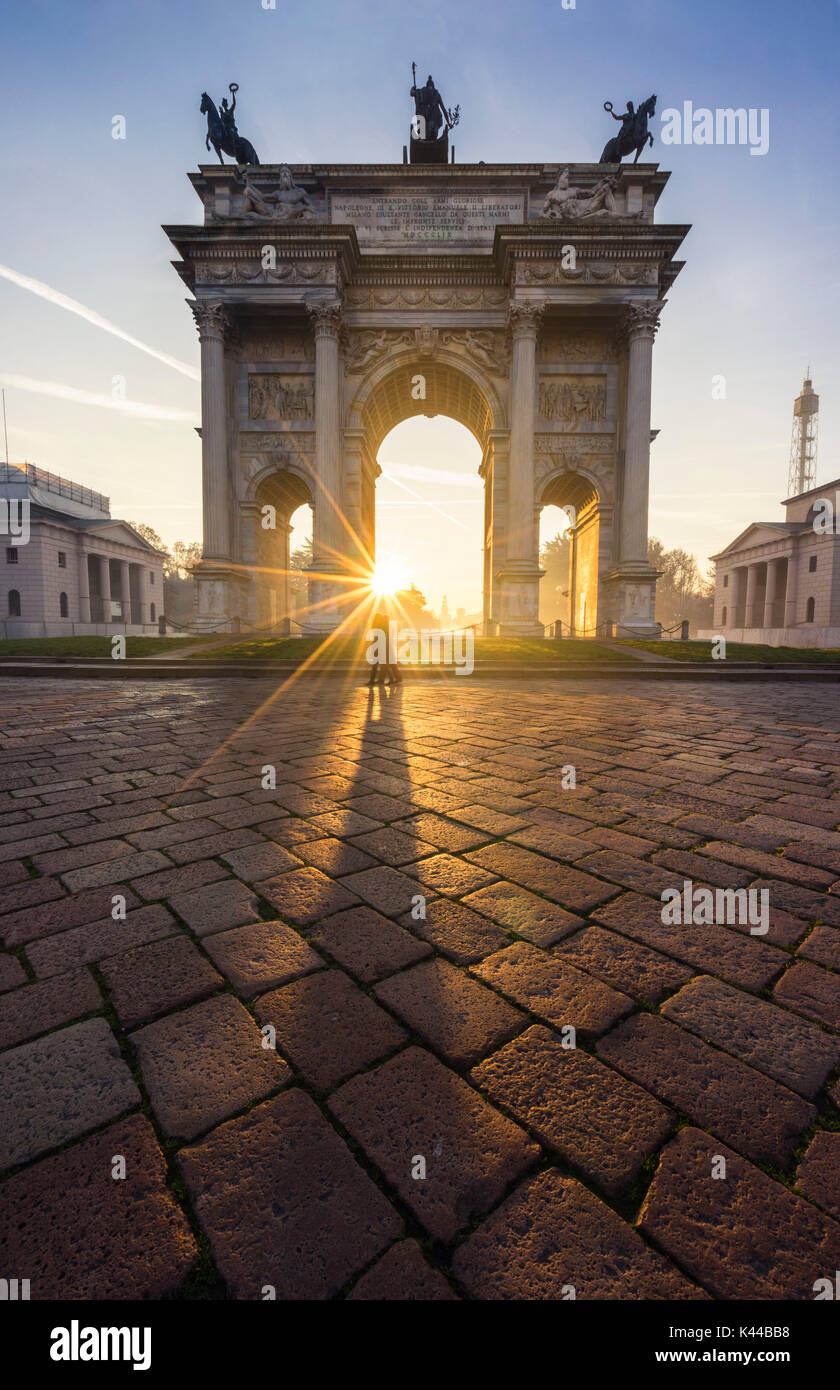Milan, Lombardy, Italy. Porta Sempione or Arco della Pace at sunrise Stock Photo