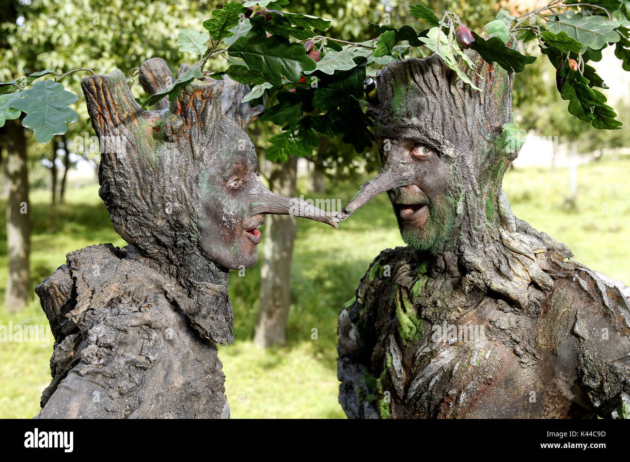 Wittenburg, Deutschland. 30th Aug, 2017. GEEK ART - Bodypainting meets SciFi, Fantasy and more: Fairytale photoshooting with model Maria and Enrico as tree-beings in the monastery garden of the monastery church Wittenburg on August 30, 2017 - A project of the photographer Tschiponnique Skupin and the bodypainter and transformaker Enrico Lein | Verwendung weltweit Credit: dpa/Alamy Live News Stock Photo
