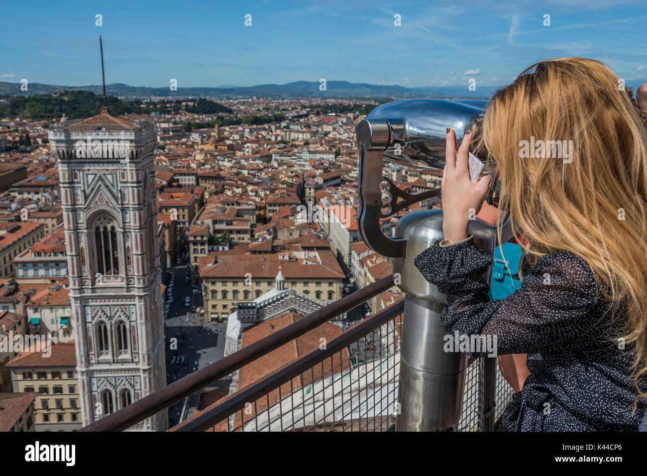 Tuscany, Italy. 4th Sep, 2017. Looking out on the tower from the dome - Tourists enjoy the Cattedrale di Santa Maria del Fiore, the main church of Florence, also known as Il Duomo di Firenze. It was designed by Arnolfo di Cambio and completed with the dome engineered by Filippo Brunelleschi. The cathedral complex is located in Piazza del Duomo, and includes the Baptistery and Giotto's Campanile. Credit: Guy Bell/Alamy Live News Stock Photo