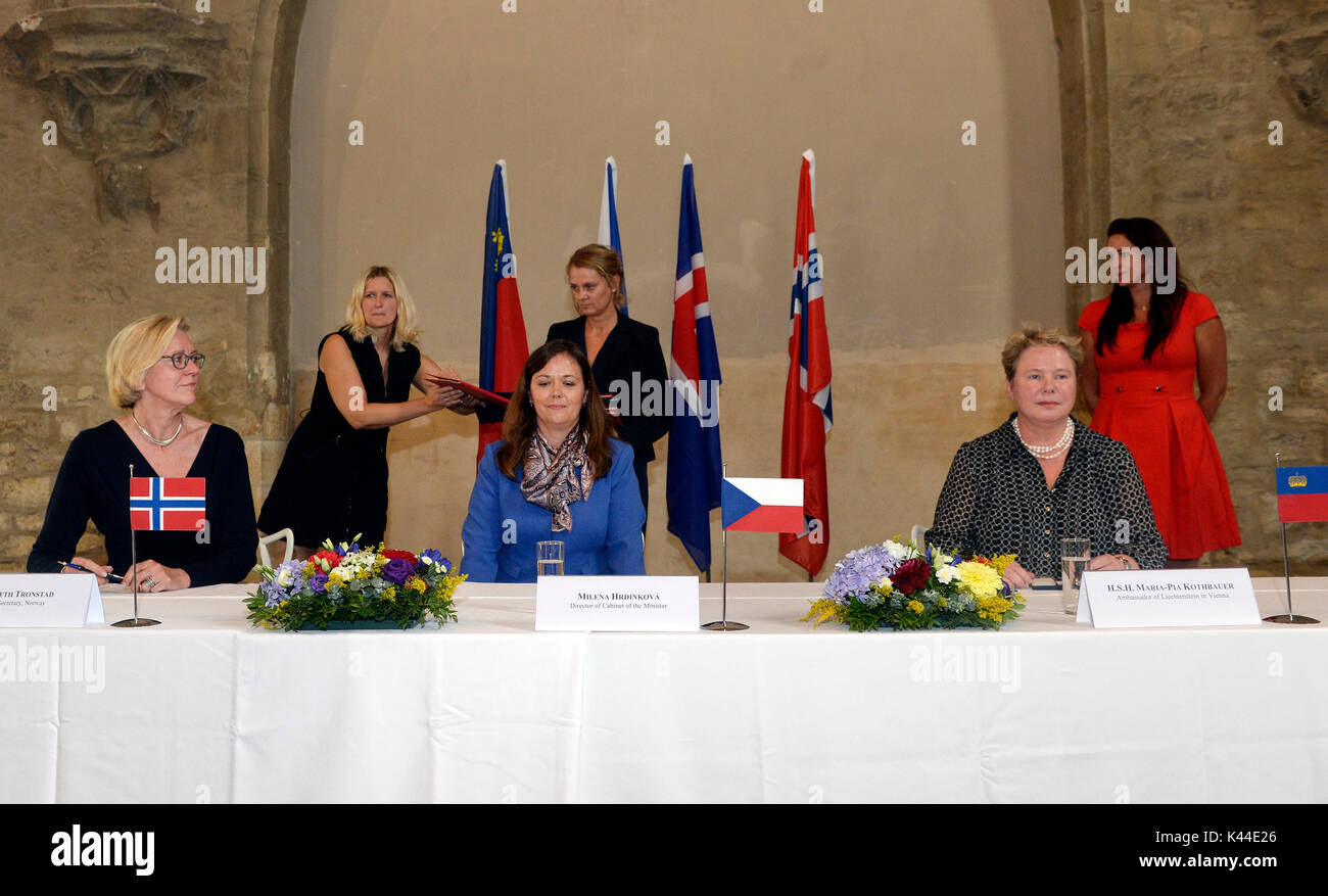 From left: Norwegian Secretary of State Elsbeth Tronstad, Czech Finance Minister's Office director Milena Hrdinkova and Ambassador of Liechtenstein to Austria and the Czech Republic Princess Maria-Pia Kothbauer signed the memorandum of understanding for financial mechanisms of the European Economic Area (EEA) and Norway for 2014 to 2021 in Prague, Czech Republic, September 4, 2017. The Czech Republic will acquire EUR184.5m (around Kc5bn) from the Norway Grants in the seven-year programming period ending in 2021. (CTK Photo/Katerina Sulova) Stock Photo